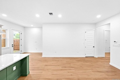 **OPEN HOUSE 7/19 11AM-1PM**Experience elevated living in this - photo 11