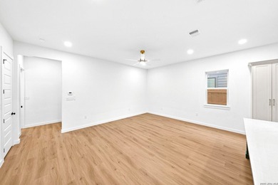 **OPEN HOUSE 7/19 11AM-1PM**Experience elevated living in this - photo 13