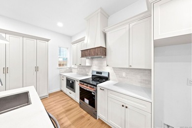 **OPEN HOUSE 7/19 11AM-1PM**Experience elevated living in this - photo 14