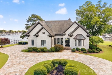 Positioned along a pristine shoreline on Lake Norman, this gated - photo 1
