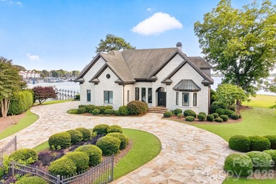 Positioned along a pristine shoreline on Lake Norman, this gated - photo 2