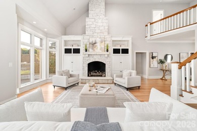 Positioned along a pristine shoreline on Lake Norman, this gated - photo 9