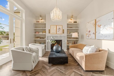 Nestled on a sprawling one-acre lot within the prestigious gated - photo 5