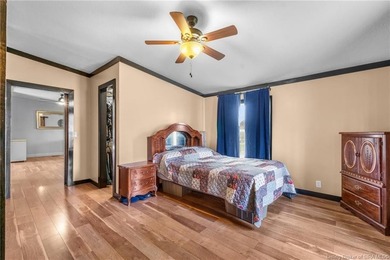 Looking for privacy, land, and value? This unique 4-bedroom, 2