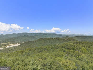 This home is at an elevation of 3200 ft sitting above clouds! - photo 36