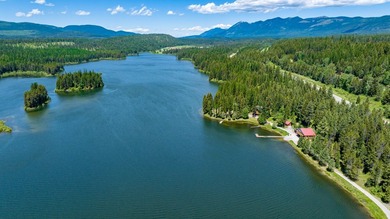 Stillwater Lake Legacy Property! Set along the crystal-clear - photo 3