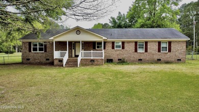 Opportunity with acreage, multiple structures, and income - photo 1