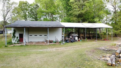 Opportunity with acreage, multiple structures, and income - photo 5