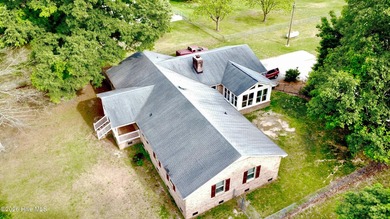 Opportunity with acreage, multiple structures, and income - photo 10