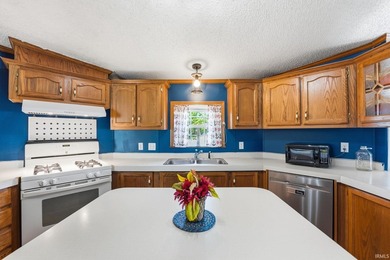 Discover turnkey lake living on Kuhn Lake, part of the - photo 12