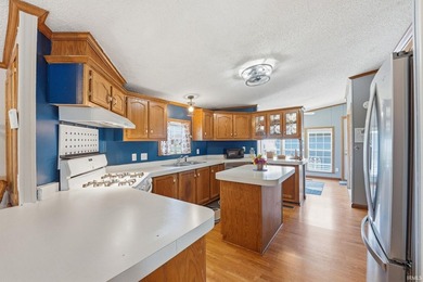 Discover turnkey lake living on Kuhn Lake, part of the - photo 13