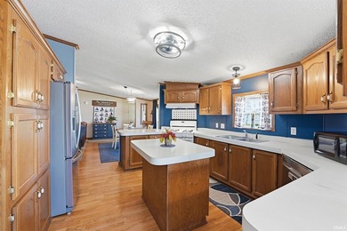 Discover turnkey lake living on Kuhn Lake, part of the - photo 15