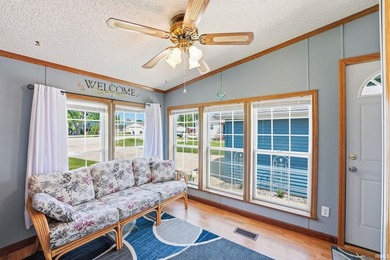 Discover turnkey lake living on Kuhn Lake, part of the - photo 16