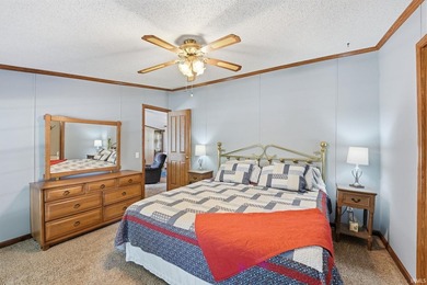 Discover turnkey lake living on Kuhn Lake, part of the - photo 18