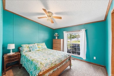 Discover turnkey lake living on Kuhn Lake, part of the - photo 21