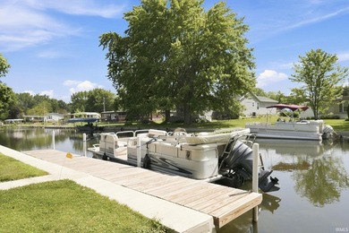 Discover turnkey lake living on Kuhn Lake, part of the - photo 26