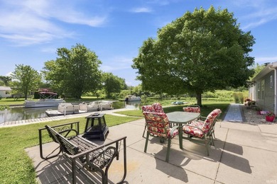 Discover turnkey lake living on Kuhn Lake, part of the - photo 28