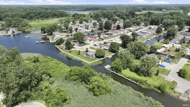 Discover turnkey lake living on Kuhn Lake, part of the - photo 30