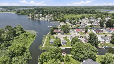 Discover turnkey lake living on Kuhn Lake, part of the - photo 32