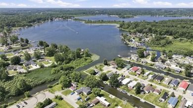 Discover turnkey lake living on Kuhn Lake, part of the - photo 33