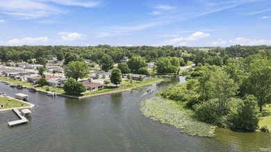 Discover turnkey lake living on Kuhn Lake, part of the - photo 34