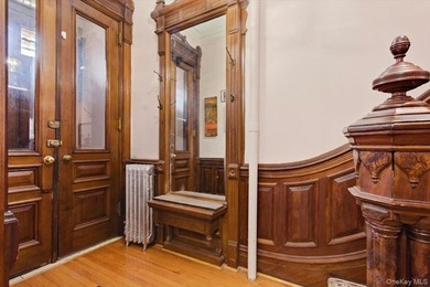 This meticulously maintained residence offers a spacious - photo 4