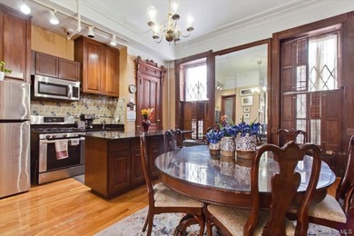 This meticulously maintained residence offers a spacious - photo 9
