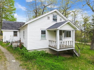 Here's an opportunity to build equity and enjoy Togus Pond. This - photo 13