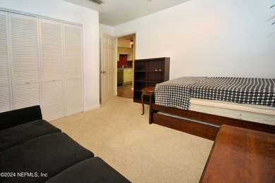 Discover this rare ground-floor unit nestled in a sought after - photo 15