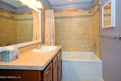 Discover this rare ground-floor unit nestled in a sought after - photo 16