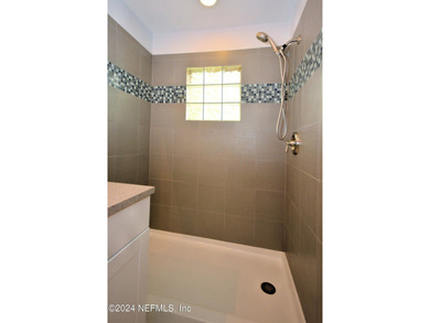 Discover this rare ground-floor unit nestled in a sought after - photo 21