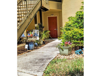 Discover this rare ground-floor unit nestled in a sought after - photo 27