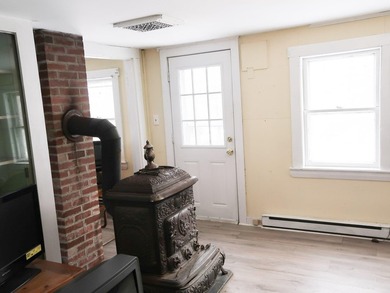 Here's an opportunity to build equity and enjoy Togus Pond. This - photo 29