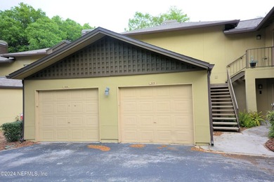 Discover this rare ground-floor unit nestled in a sought after - photo 30
