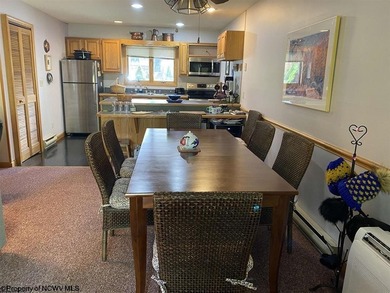 Charming and fully furnished 3-bedroom, 3-bath condo located in - photo 3