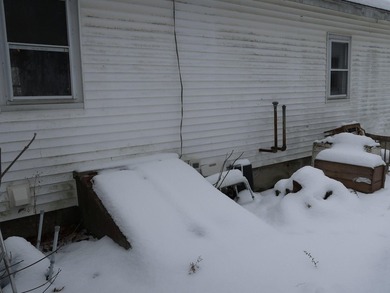 Here's an opportunity to build equity and enjoy Togus Pond. This - photo 53