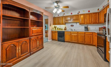 Private, spacious Royal Pines home with added rear porch and - photo 11