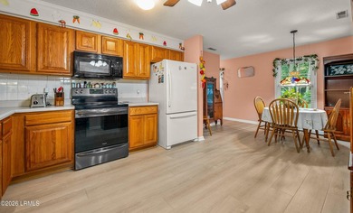 Private, spacious Royal Pines home with added rear porch and - photo 12