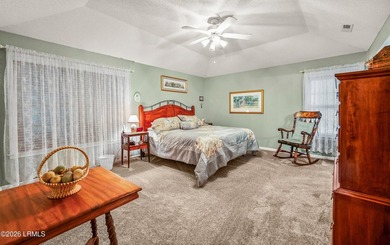 Private, spacious Royal Pines home with added rear porch and - photo 16