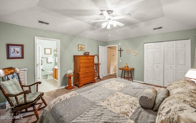 Private, spacious Royal Pines home with added rear porch and - photo 17