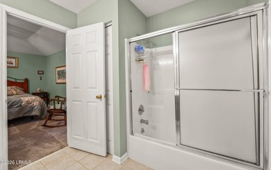 Private, spacious Royal Pines home with added rear porch and - photo 19
