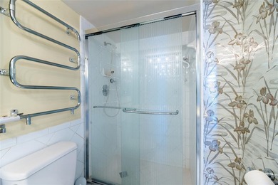 Spacious three bedroom, two bath corner unit located on the - photo 19