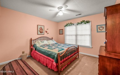 Private, spacious Royal Pines home with added rear porch and - photo 21