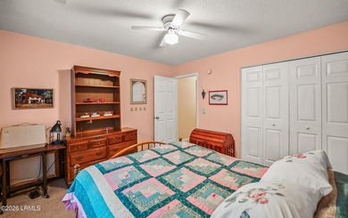 Private, spacious Royal Pines home with added rear porch and - photo 22