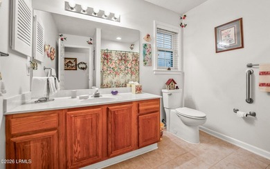 Private, spacious Royal Pines home with added rear porch and - photo 23