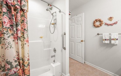 Private, spacious Royal Pines home with added rear porch and - photo 24