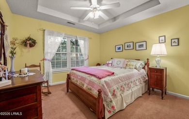 Private, spacious Royal Pines home with added rear porch and - photo 25