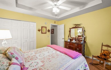 Private, spacious Royal Pines home with added rear porch and - photo 26