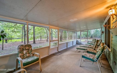 Private, spacious Royal Pines home with added rear porch and - photo 27