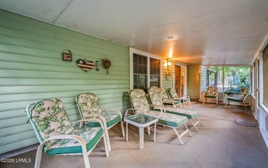 Private, spacious Royal Pines home with added rear porch and - photo 28